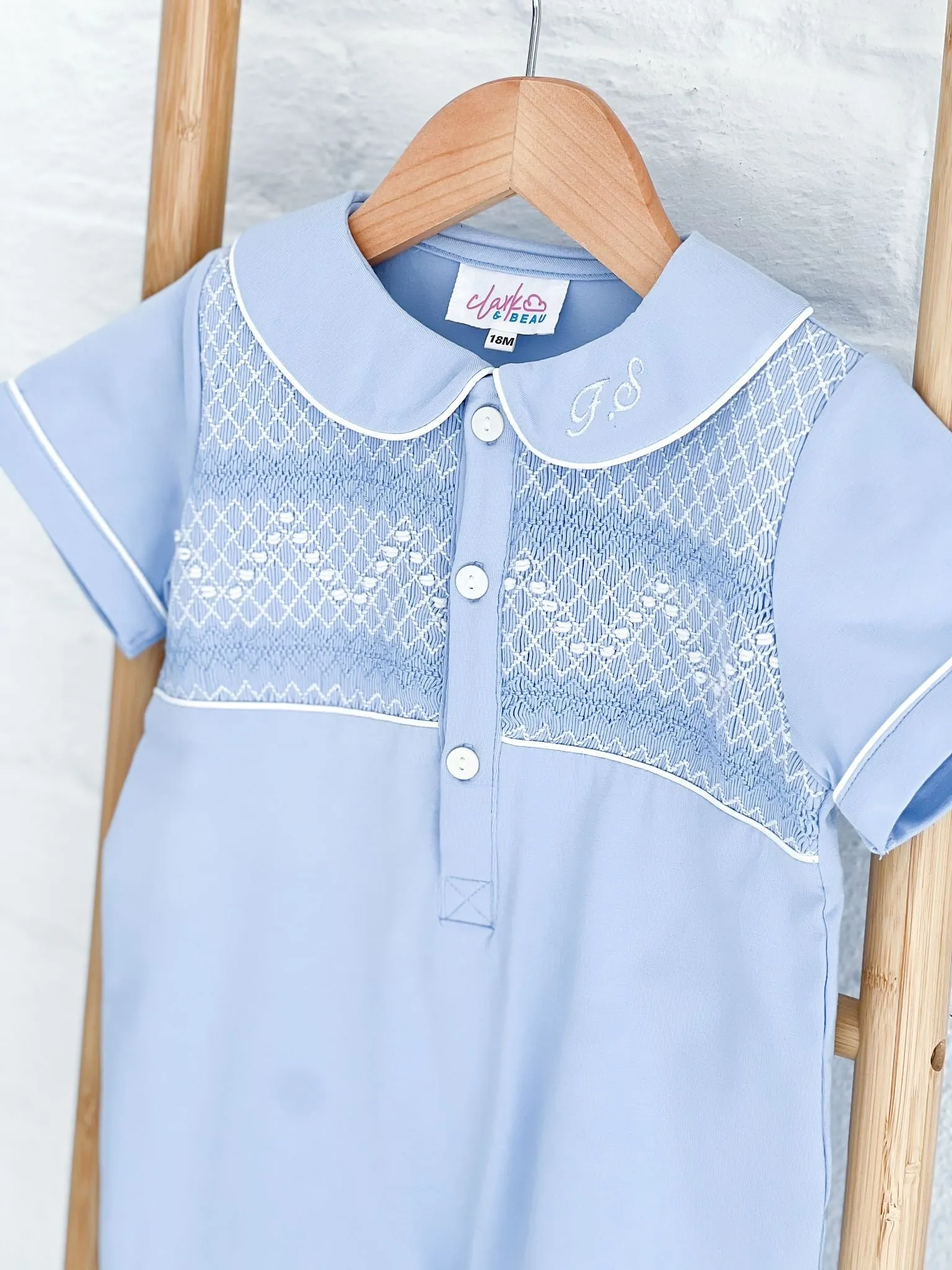 Boys Blue Smocked Romper Trimmed with White