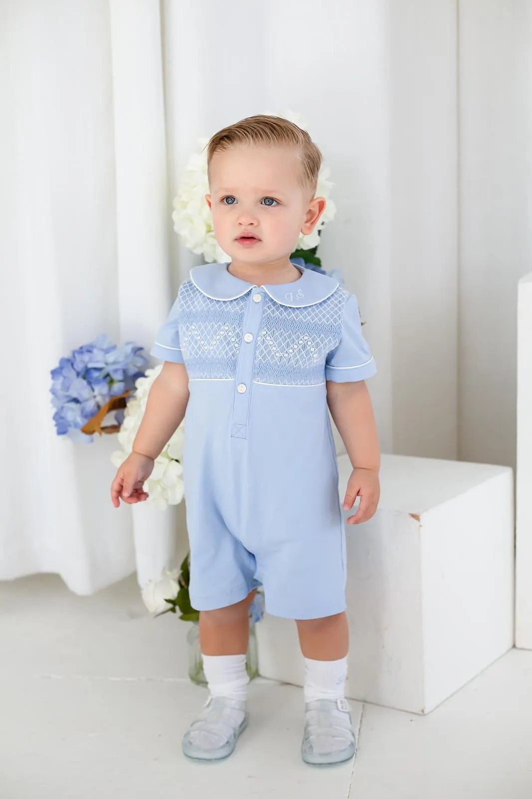 Boys Blue Smocked Romper Trimmed with White