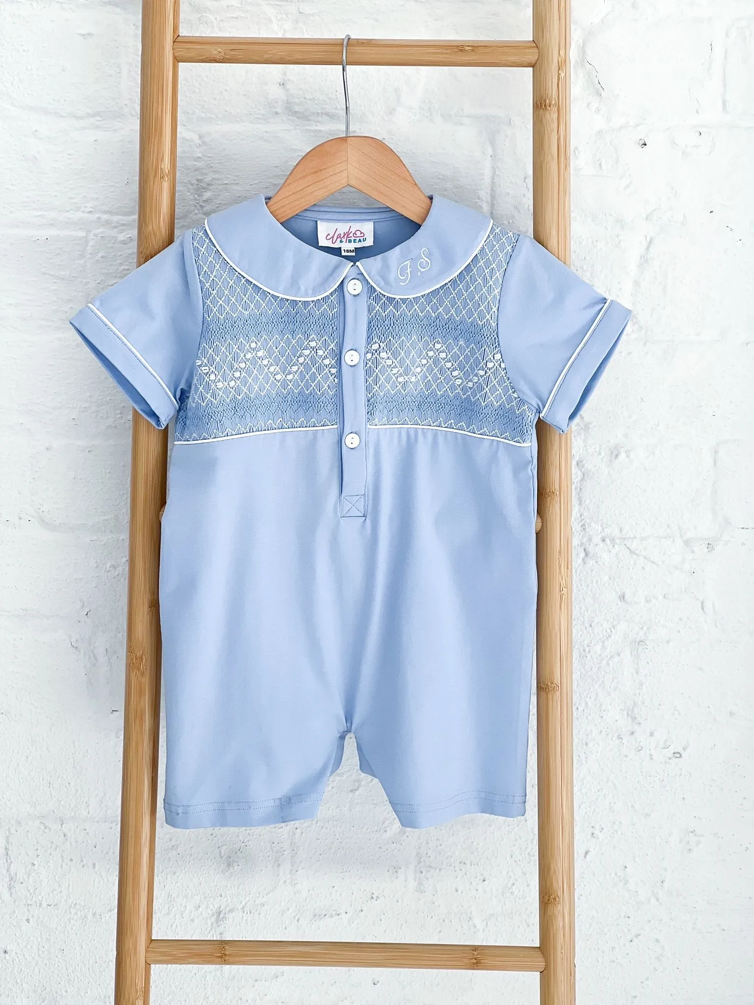 Boys Blue Smocked Romper Trimmed with White