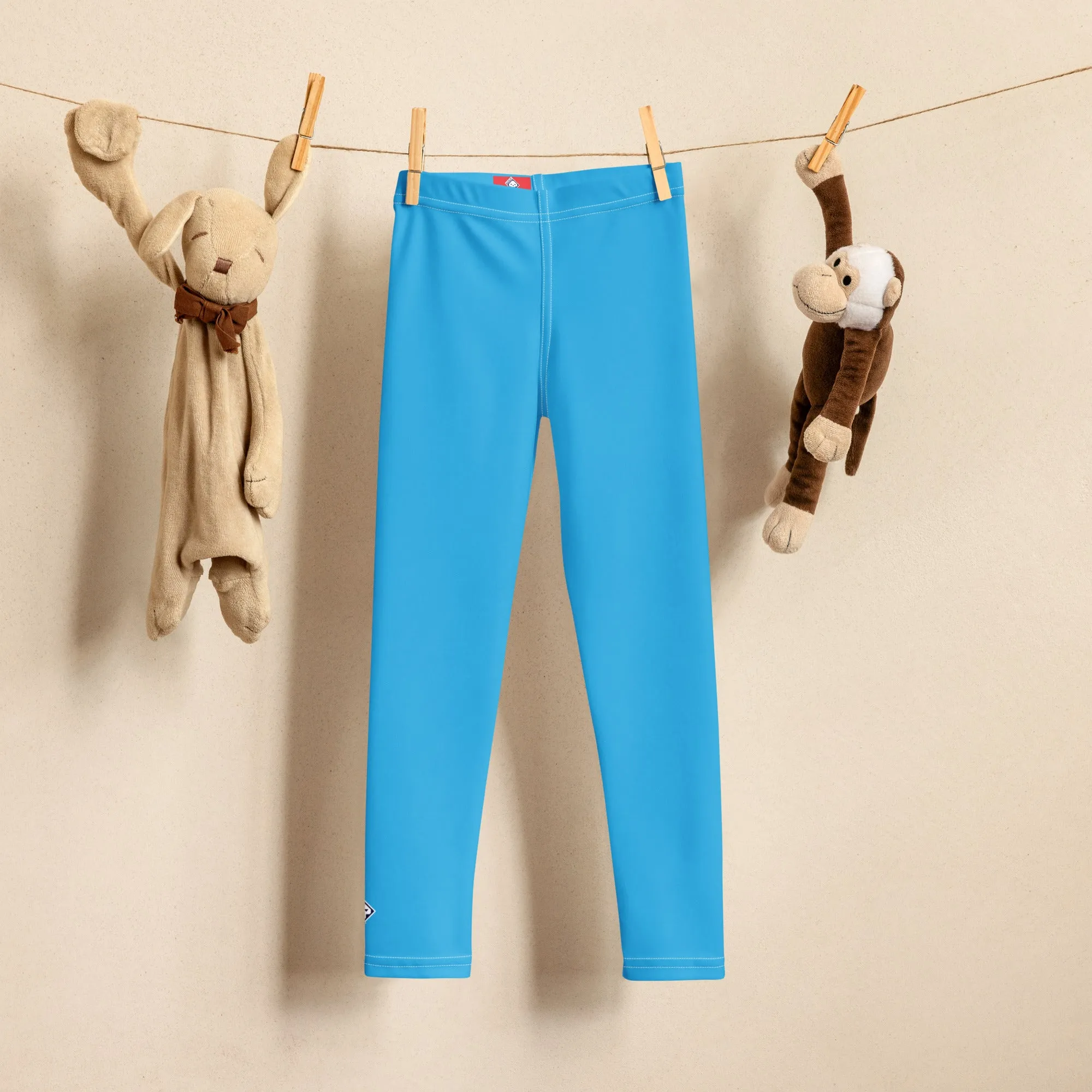 Dynamic Days: Solid Color Leggings for Active Boys - Cyan