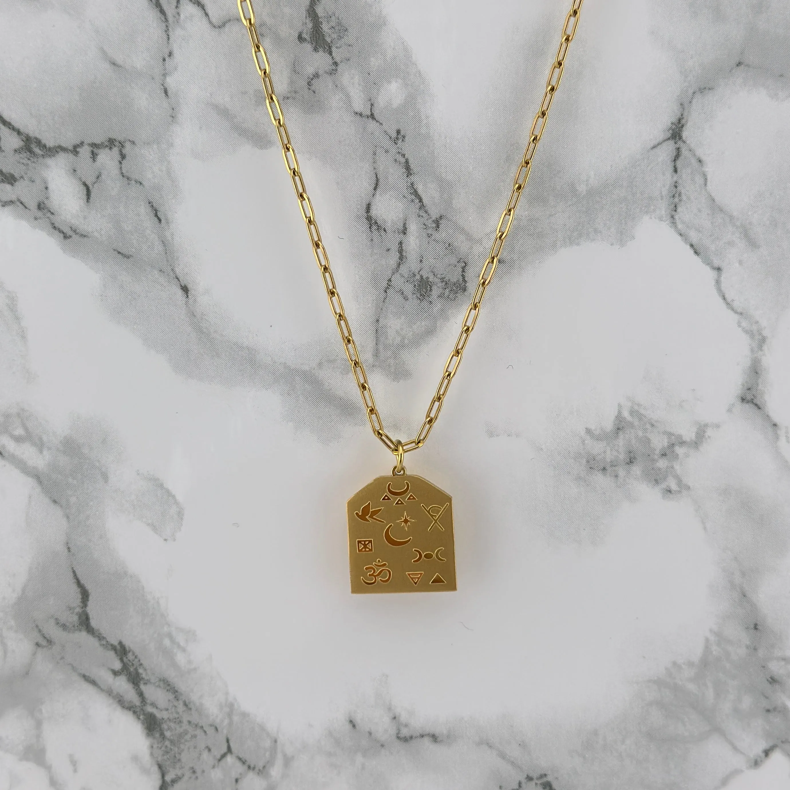 Gold Omnism necklace