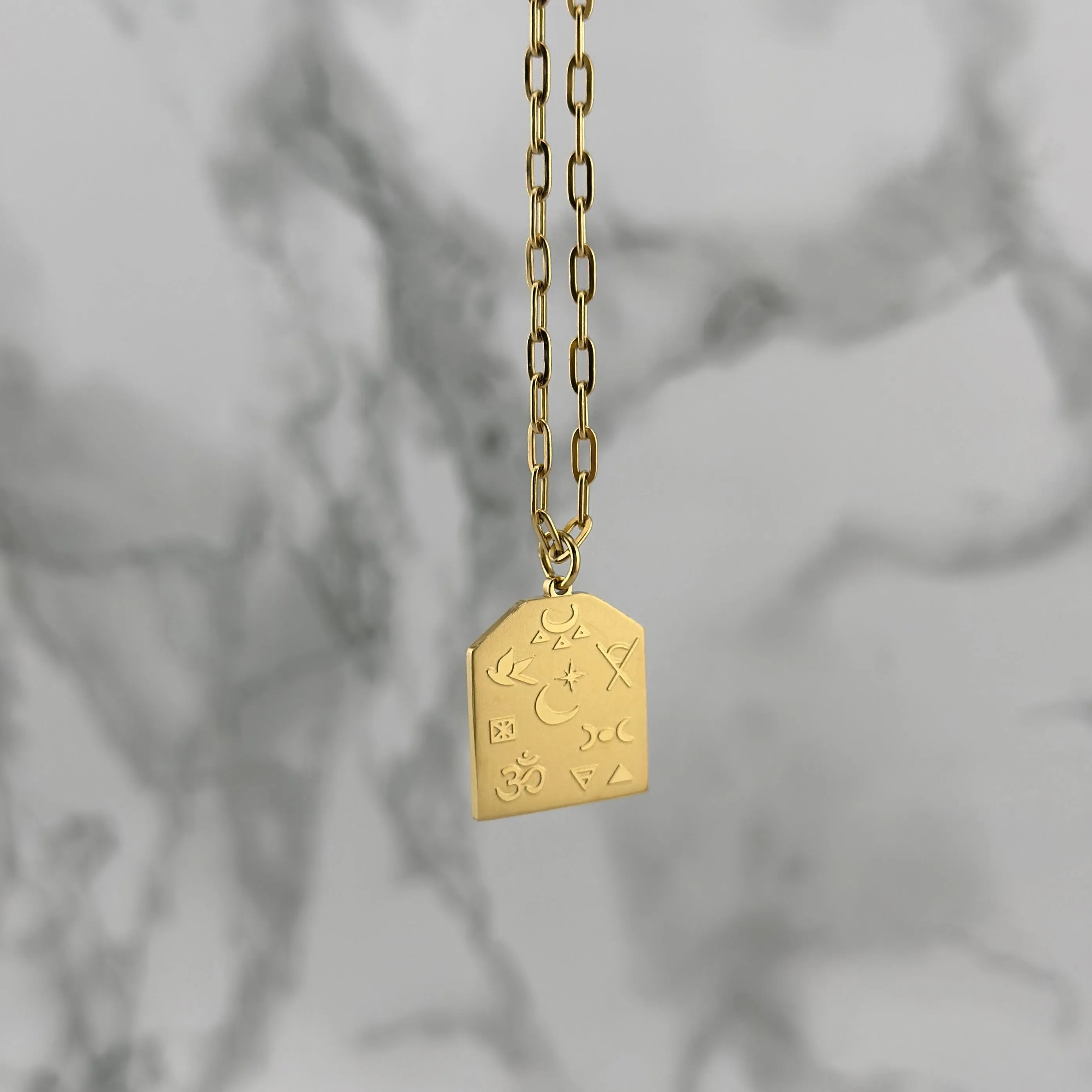 Gold Omnism necklace