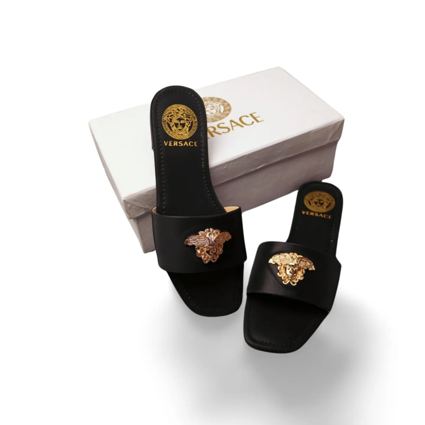 Women's Elegant Flat Sandals with Gold Medusa Embellishment